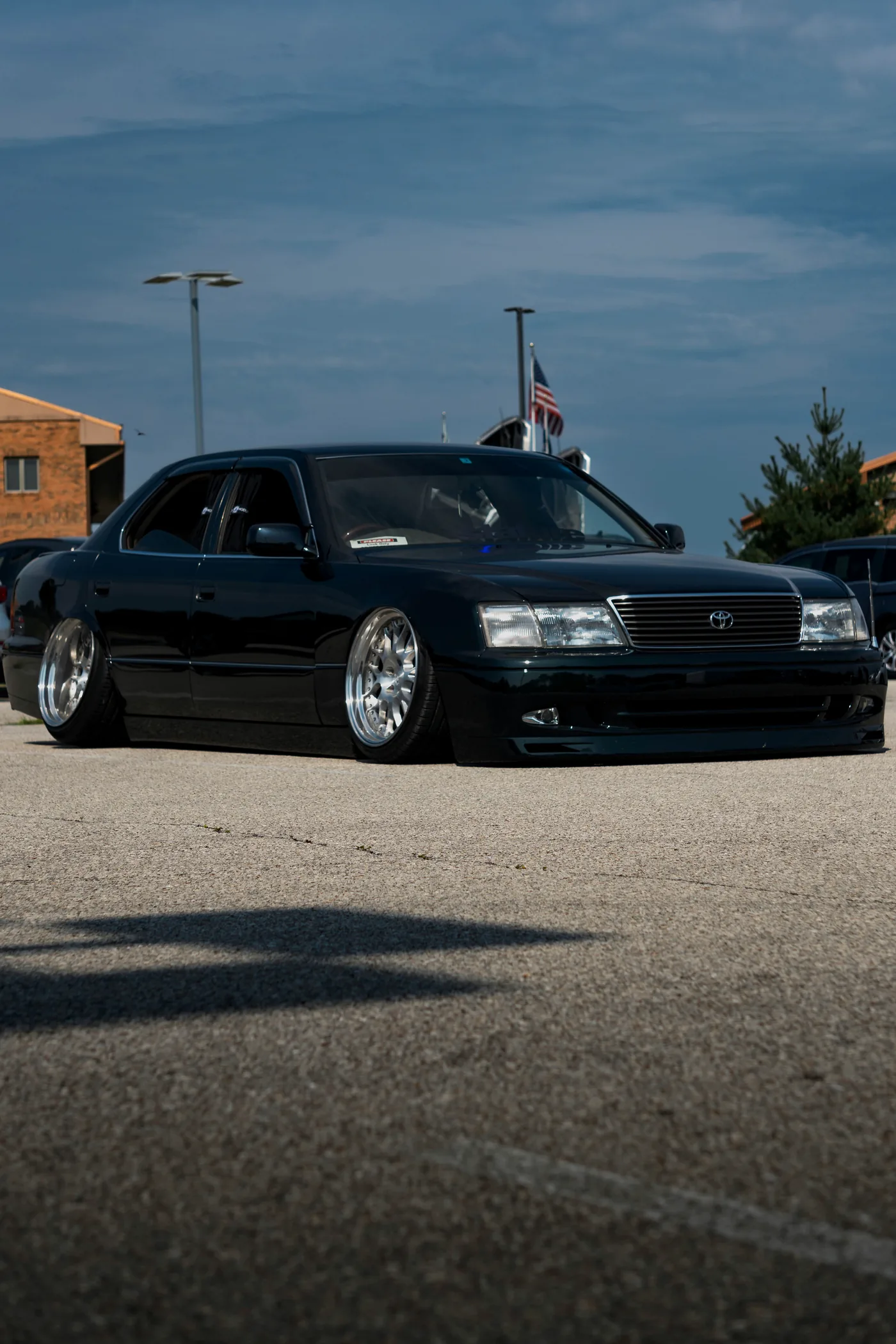 Toyota Celsior shot low from the rear three-quarter angle